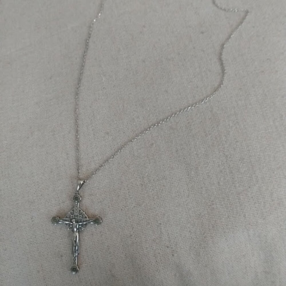 Two-sided Crucifix necklace. Jesus on one side Virgin Mother on the other.